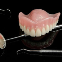 Pros and cons of dentures